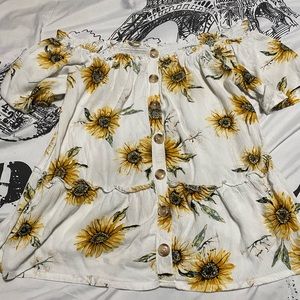 Maurice open shoulder top fits up to a size Large